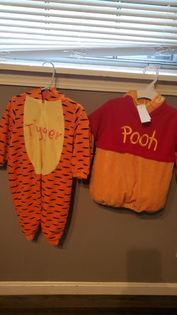 Halloween costumes Tigger and Winnie pooh