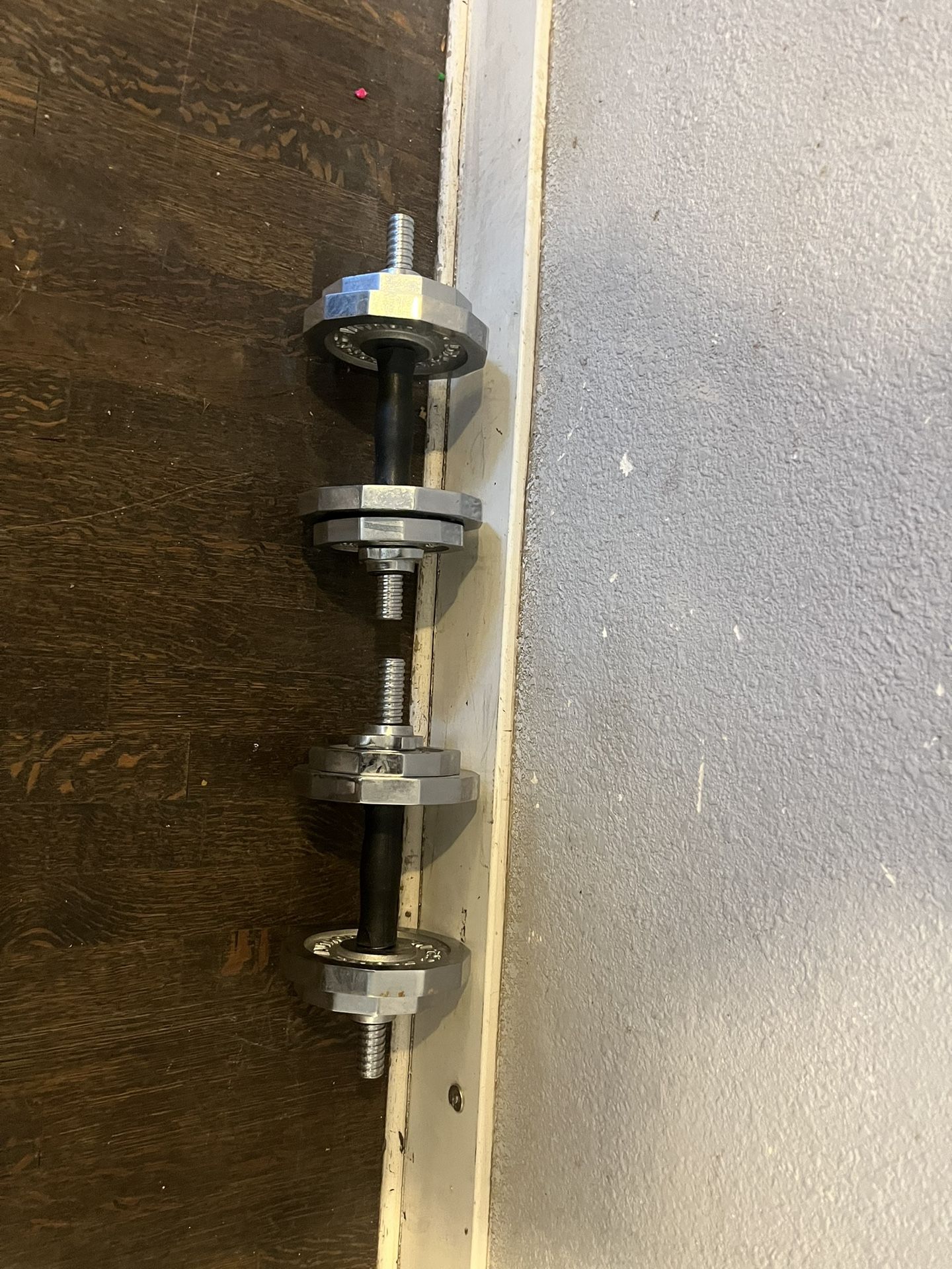 Pair of Sports Authority Standard Size adjustable dumbbells With Weight Plates