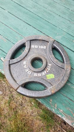 One 25 pound Olympic Grip Weight