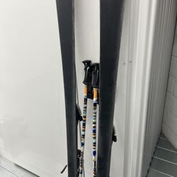 Fisher Skis, poles and Solmon ski boots
