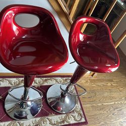 Beautiful, matching pair, red and chrome barstools in very good condition