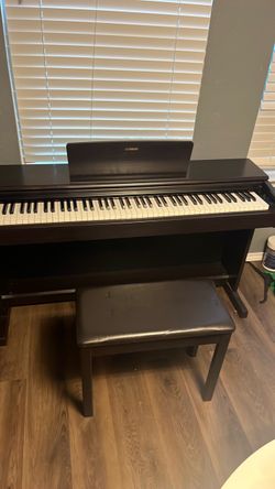 Yamaha Arius YDP-144 electric piano