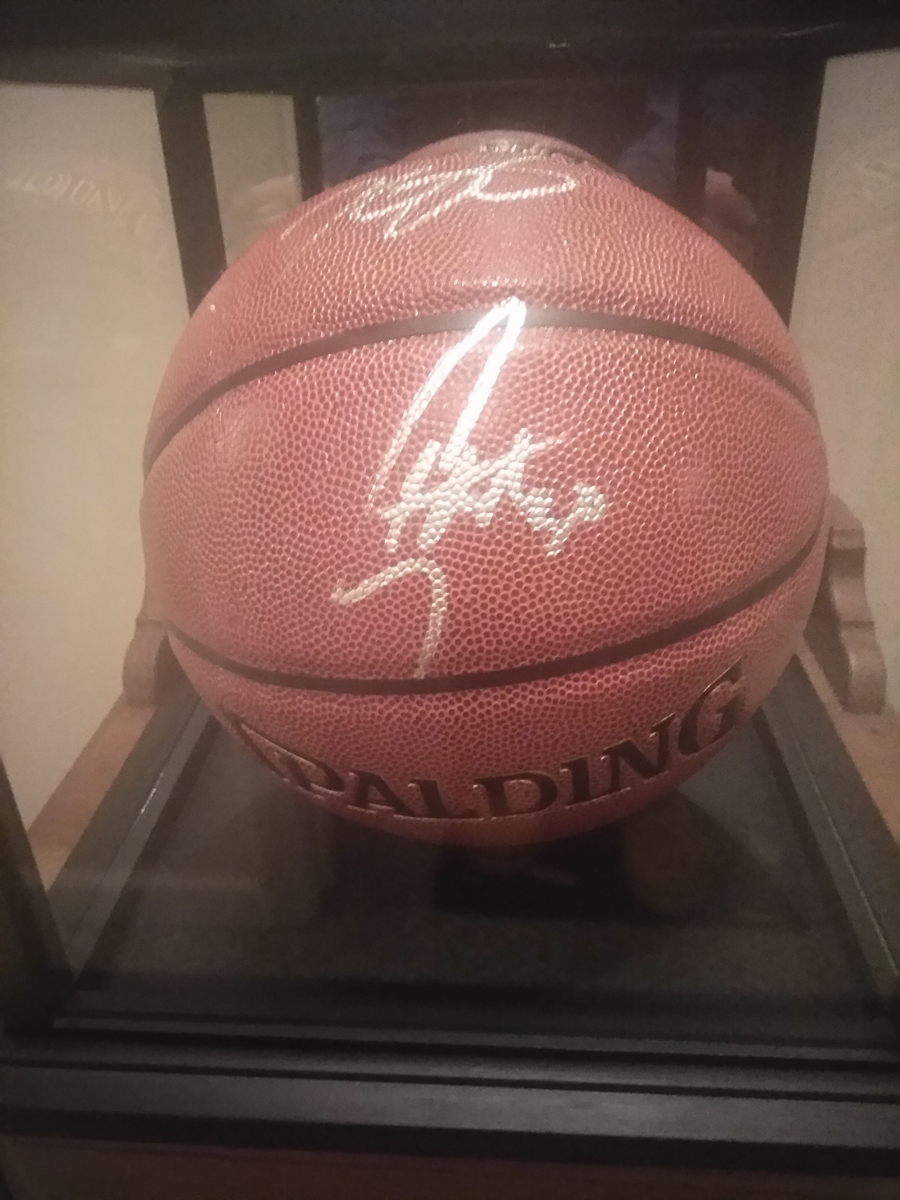 Stephen Curry & Kevin derant authentic signed basketball in glass case with certificate of authenticity in mint condition