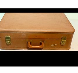 AI Overview                    Vintage Cadillac Brougham Tan Leather Suitcase