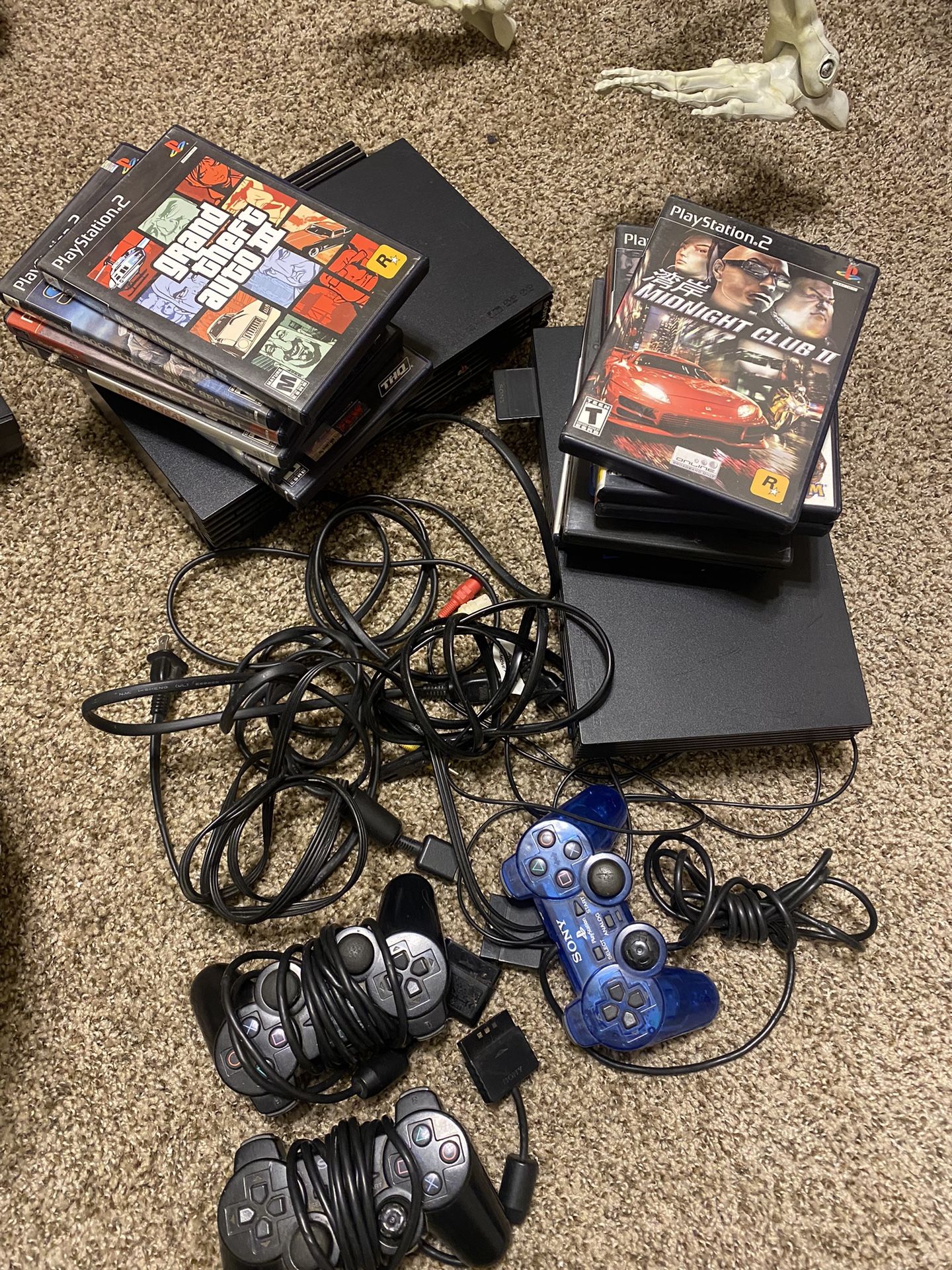 2) Play Station Consoles, Controllers And Games.