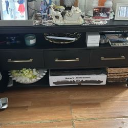 TV stand  55 Inches Long And 29 Inches Tall 