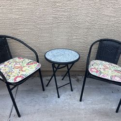 Patio Table And 2 Black Chairs
