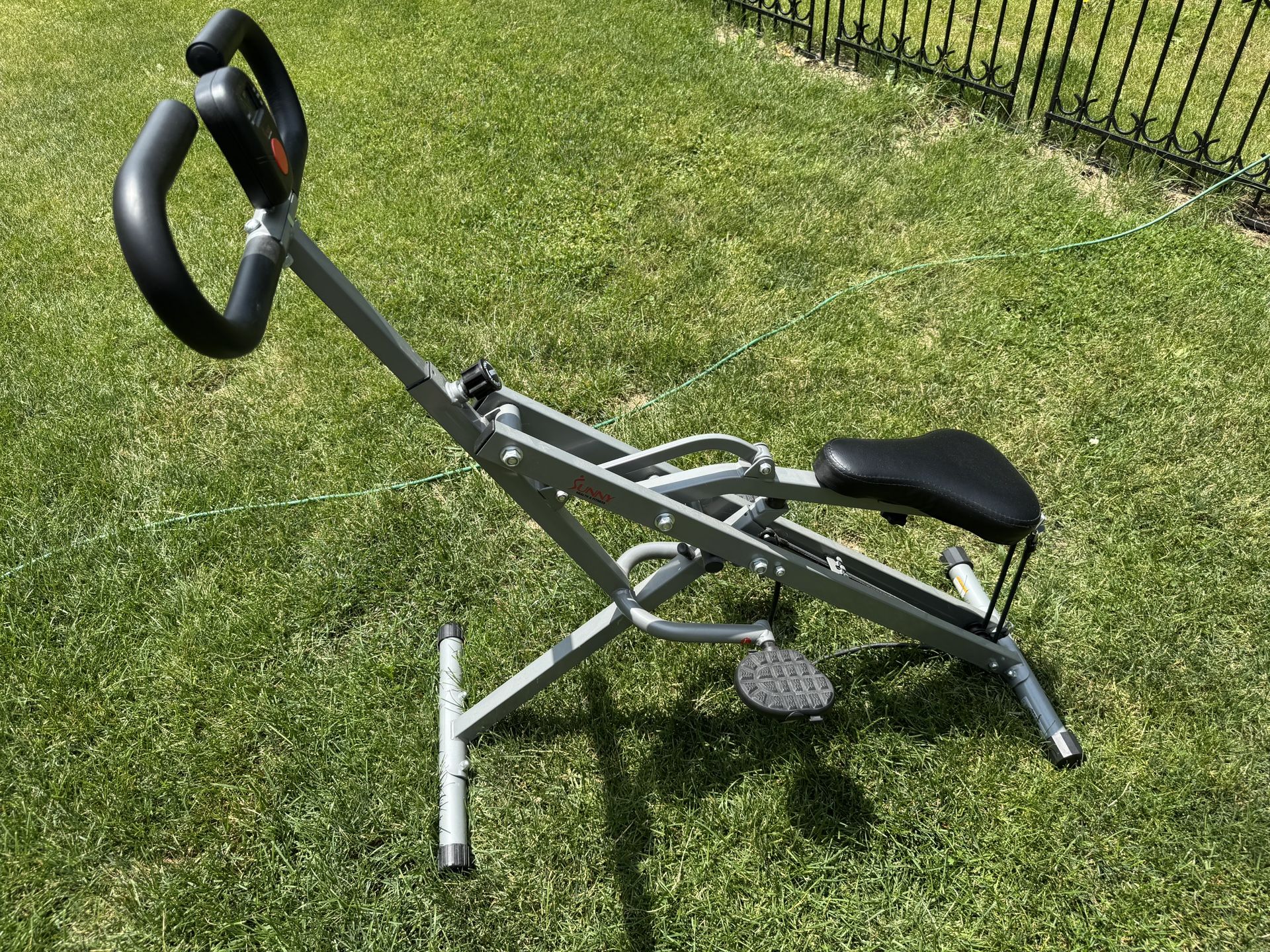 Sunny Health & Fitness Row-N-Ride Squat Assist Trainer