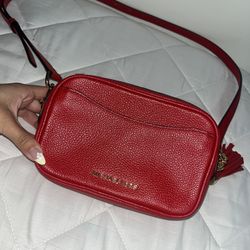 Red Michael Kors Hand bag(cross body)
