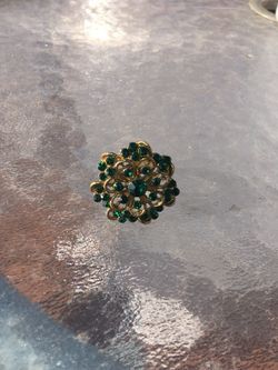 Green jeweled ring