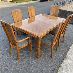 Vintage cane back dining set table With Leafs and six chairs 