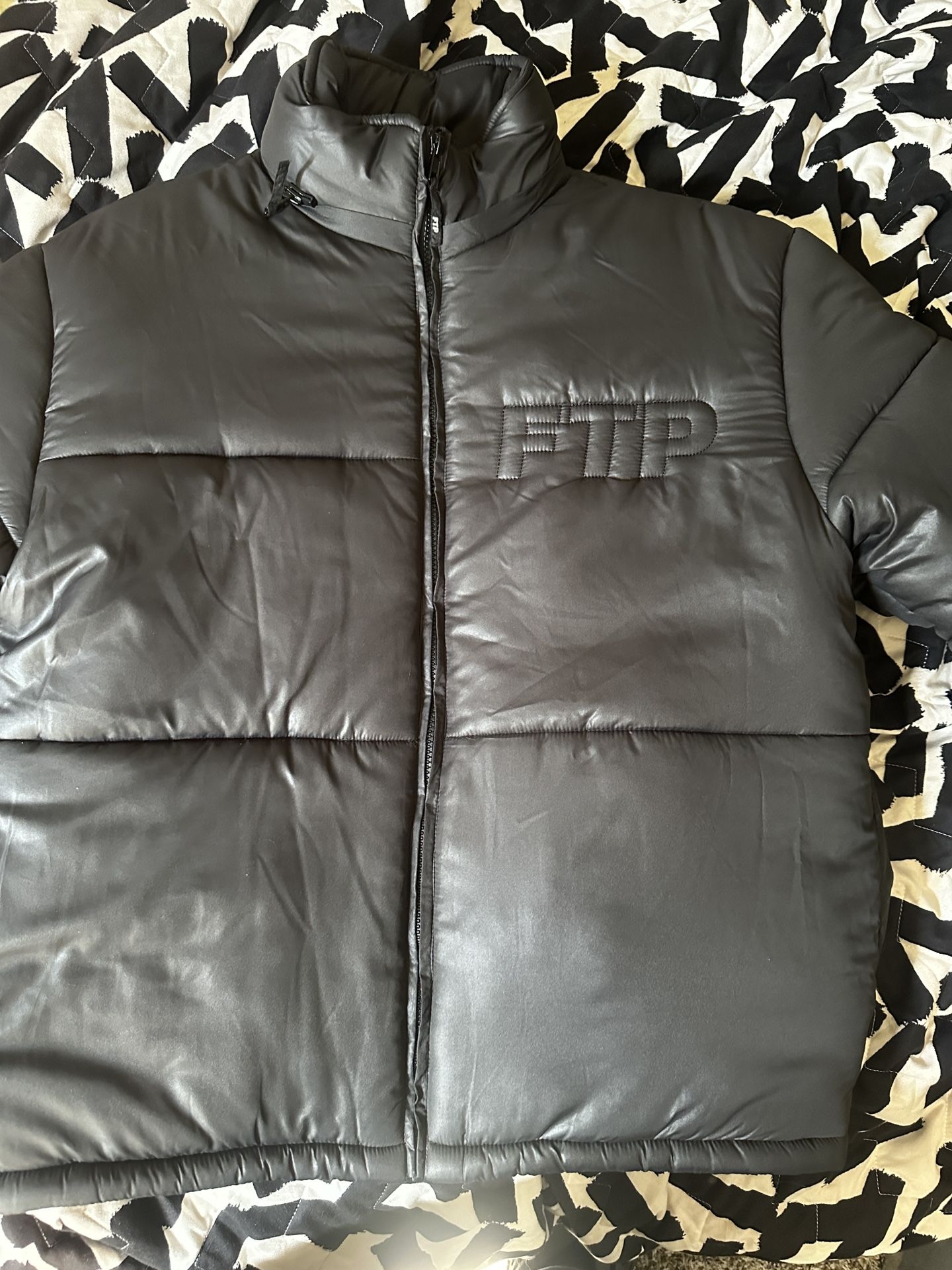 FTP PUFFER JACKET SIZE L OR XL