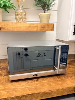 18 inch / 11   Oster Microwave