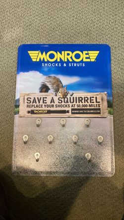 Vintage Monroe save a squirrel metal sign
