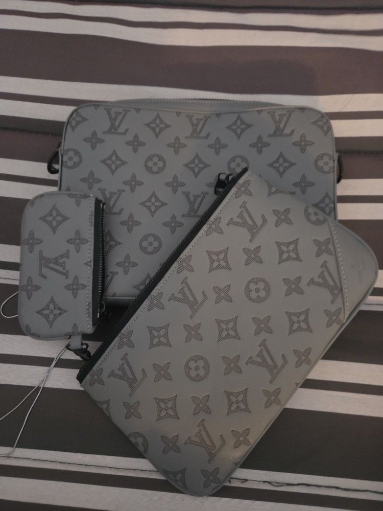 Louis Vuitton Pochette Voyage MM in gray Monogram Eclipse canvas