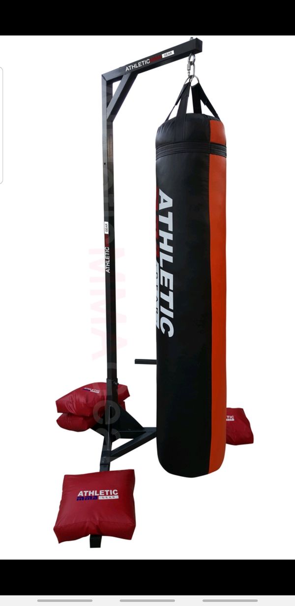 Muay Thai heavy bag 6' tall 150 pound with stand and 4 weight bags for