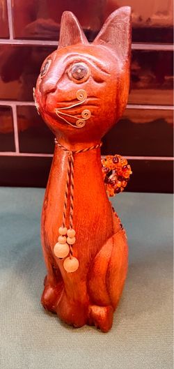 Beautiful hand carved wooden regal cat sculpture with beaded tail