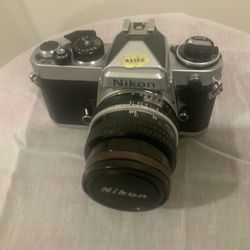 Nikon FE  And Accessories.  $275.00