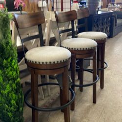 Signature DESIGN BY ASHLEY Valebeck 30.5 in. Brown High Back Wood Bar Height Stool with Polyester Upholstery Seat