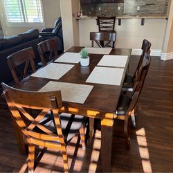 Dining table and 8 chairs