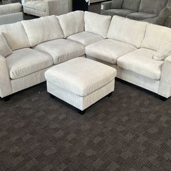 Cream Beige Sectional And Ottoman 