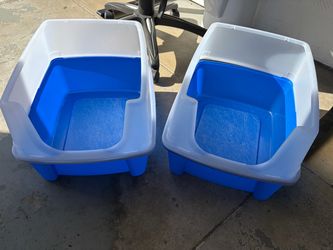 Litter boxes with high sides
