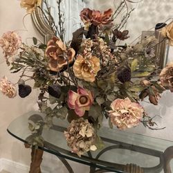 Decorative silk floral arrangement featuring a mix of dried-style flowers, roses, and hydrangea in a neutral color palette