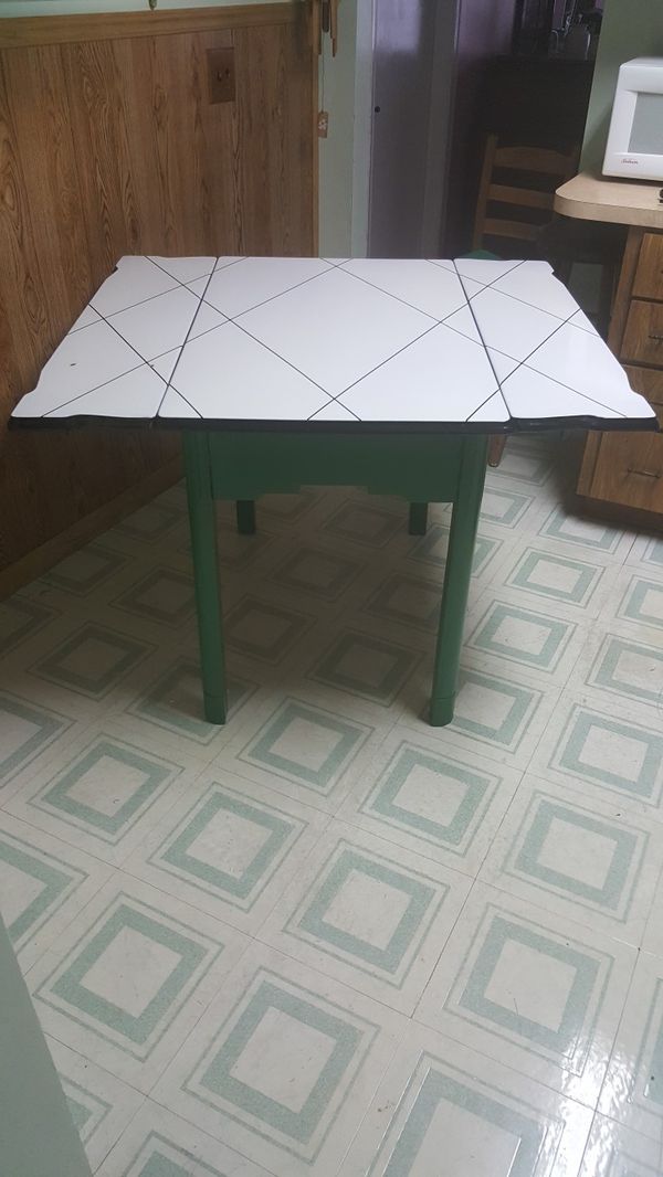 Antique Porcelain Top Table W 2 Pull Out Leaves And Silverware Antique Porcelain Top Table W 2 Pull Out Leaves And Silverware Drawer 40 31 H 25 D Add 10 For Each Leaf In North Miami Beach Fl Offerup