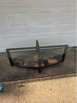 COFFEE TABLE. 26"w x 22"deep x 19"tall; a few scratches; cross streets are Arapaho & Waterview
