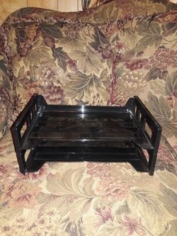 2- black stacking trays.