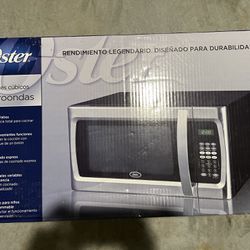 Oster 1.3cu Ft Counter Microwave 