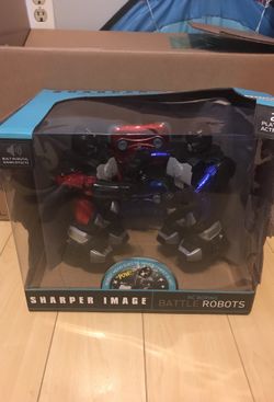 Sharper image remote control sock em robots for kids