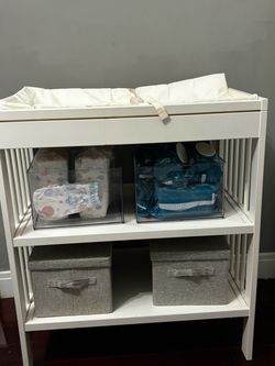 Diaper changing station and pad