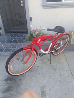 Men's 26" red and white beach cruiser