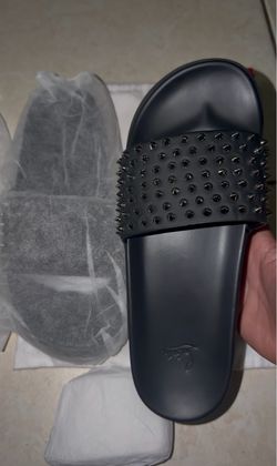 Christian Louboutin red bottom spike slides