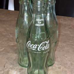 (5) Coca-Cola Bottles 