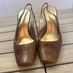Nine West Brown leather slip on heels with strap, size 9