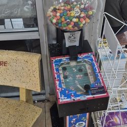Vintage Coin-Operated Gumball Machine with Football Arcade Game