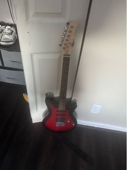 Electric guitar with speaker