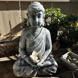 Garden Buddha, Clay Pots And Old Golf Clubs