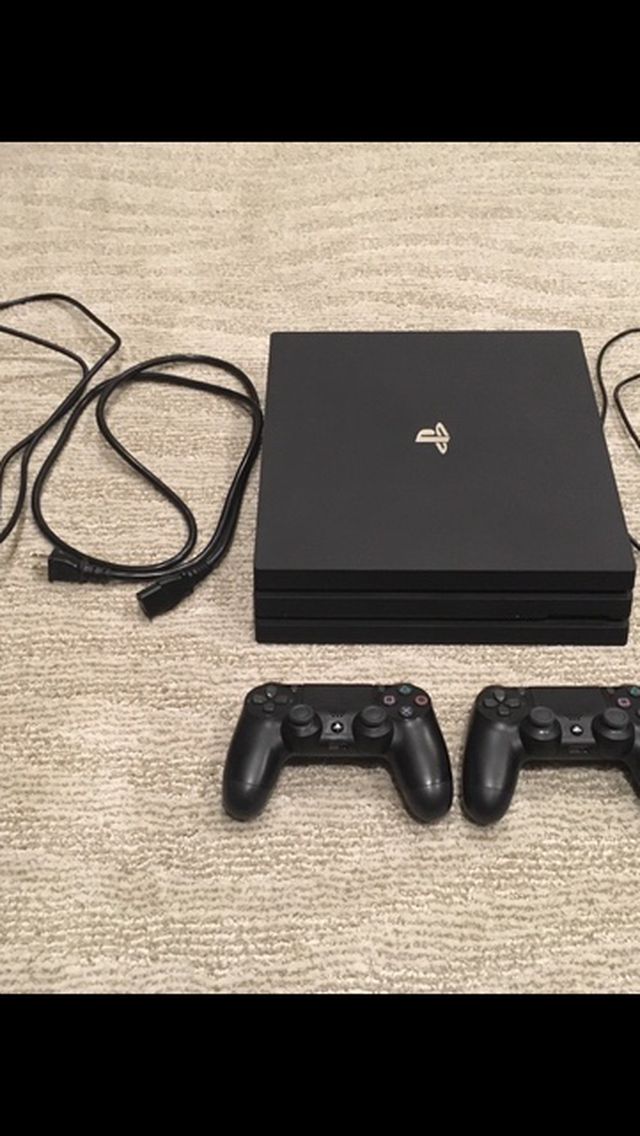 PS4 Pro with 2 Terabyte seagate harddrive and standard accessories.