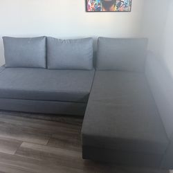 Grey IKEA sectional pull out bed