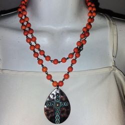 Orange Beaded Necklace With Cross Pendant