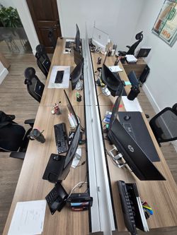 Long Bench-Style Office Desk System with Privacy Dividers