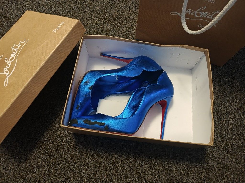 Christian Louboutin (Red Bottoms)