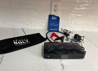 Halo Bolt Ultimate portable jump starter and air compressor with ac/ dc plug