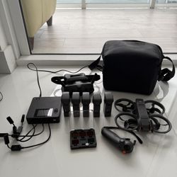 DJI Avata 2 Fly More + 5 Brand New Batteries + DJI Pro controller + ND filters + Simultaneous 4 Battery Fast Charger