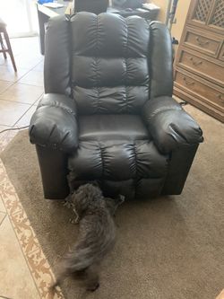 Black faux leather rocking chair