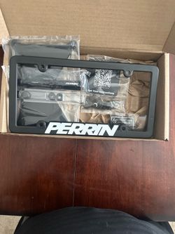 Perrin front license plate relocation kit for Subaru