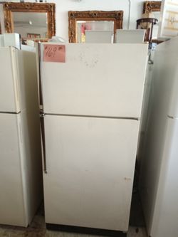 Kenmore Refrigerator tan works great . Warranty . Delivery available . 2203 Fowler st. Ft. Myers 33901